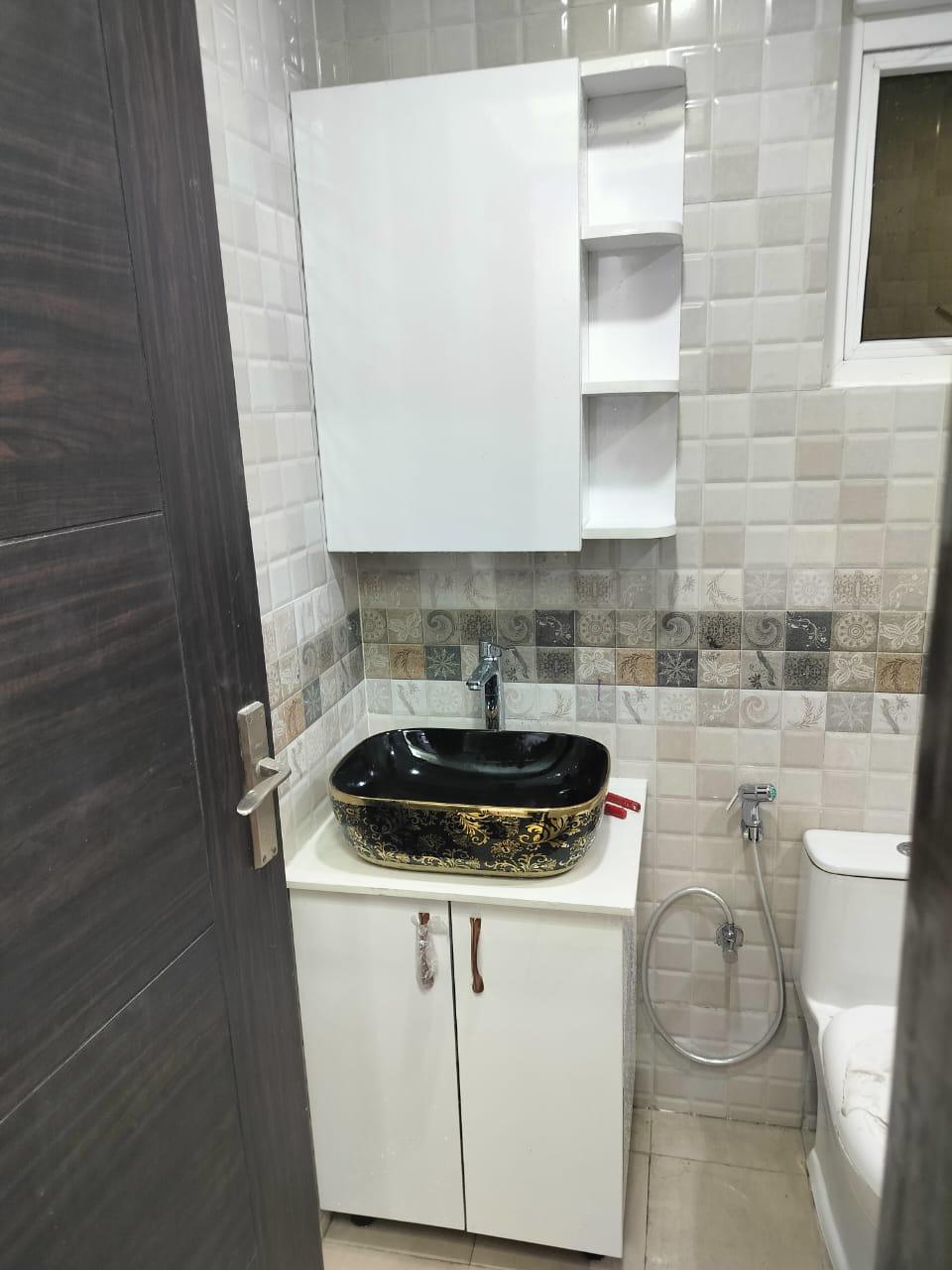 Bathroom vanity with countertop vessel basin