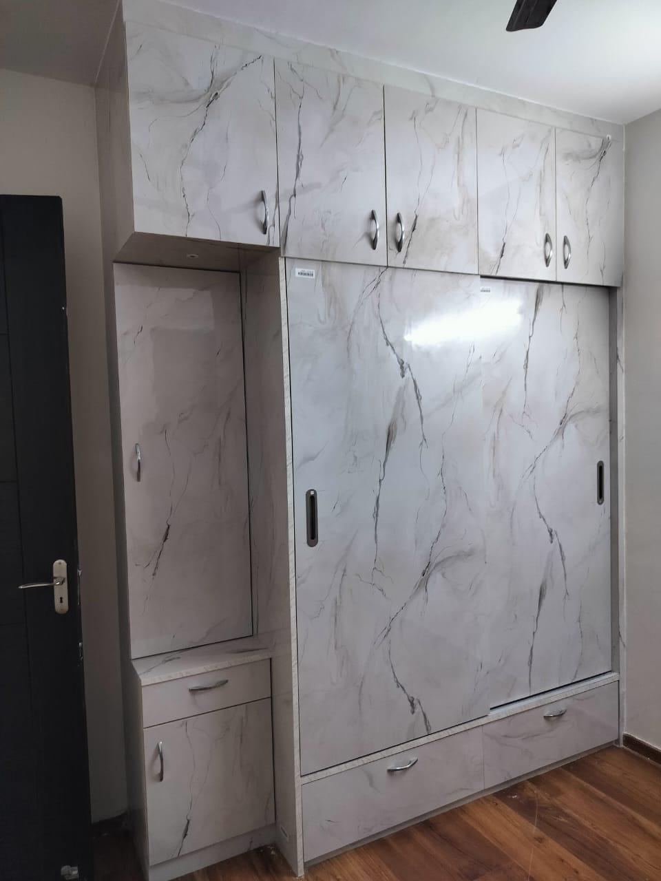 Marble-finish modular wardrobe with dresser unit