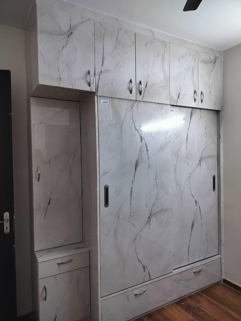 Full-height marble-finish wardrobe with side dresser unit